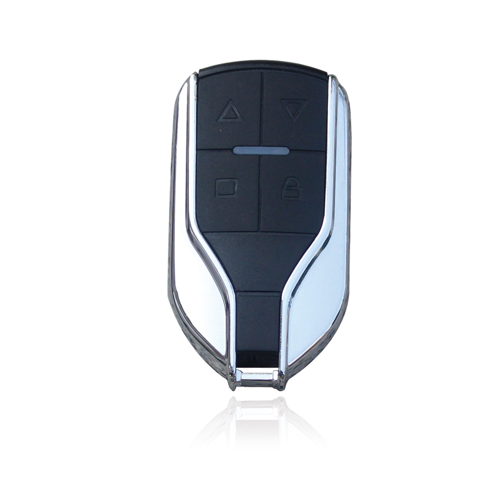 Supplied black control with silver side edges and four visible button areas, reference R4